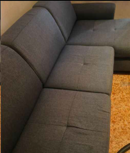 Sofá después de la limpieza a domicilio en Catalunya